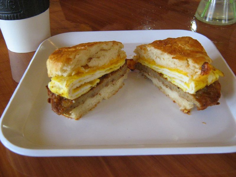Arkansas Democrat-Gazette/ROSEMARY BOGGS - Andre's Coffee Shop in North LIttle Rock - A sausage and egg biscuit