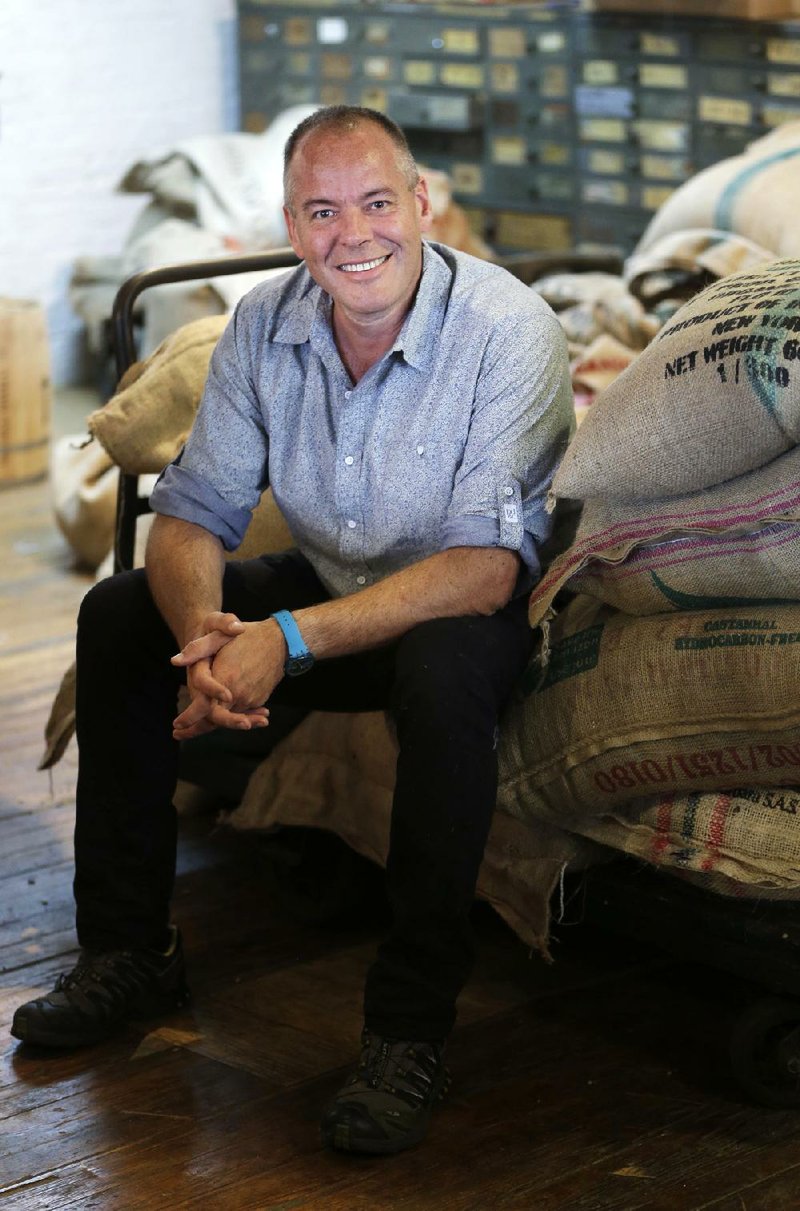 In this July 14, 2014 photo, Jim Munson, owner of Brooklyn Roasting Company, poses for photos in New York. Sales of the company’s Free Trade coffee have soared from $900,000 in 2011 to $4.4 million last year, and are expected to reach $6 million in 2014. (AP Photo/Seth Wenig)