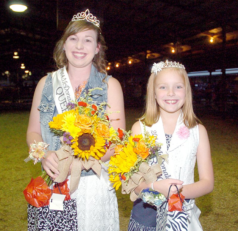 RICK PECK MCDONALD COUNTY PRESS Whitley Mitchell (left) was crowned Queen and Rylie Huston was crowned Princess during coronation ceremonies to kick off last week&#8217;s 40th annual McDonald County Fair.