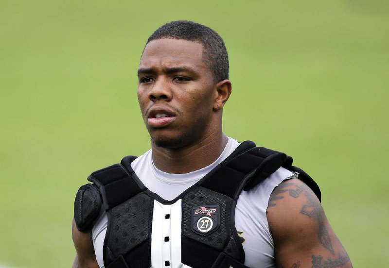 Baltimore Ravens running back Ray Rice walks off the field after a training camp practice, Thursday, July 24, 2014, at the team's practice facility in Owings Mills, Md. (AP Photo)