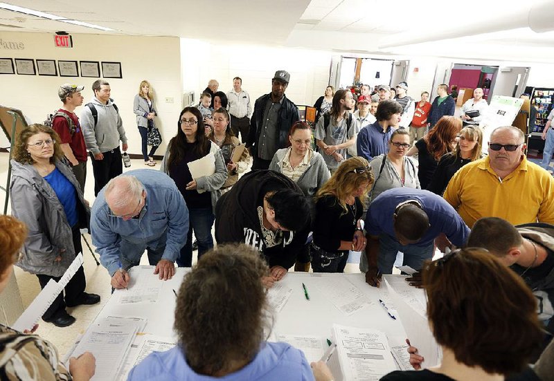 Hopefuls line up for a job fair at Columbia-Greene Community College in Hudson, N.Y., in April. A far more durable U.S. economy has emerged from the wreckage of the recession, economists say.