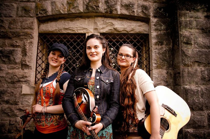 Gold Heart — (from left) sisters Tori Gold on mandolin, Shelby Gold on fiddle and Jocey Gold on guitar — will perform Monday in Paragould.