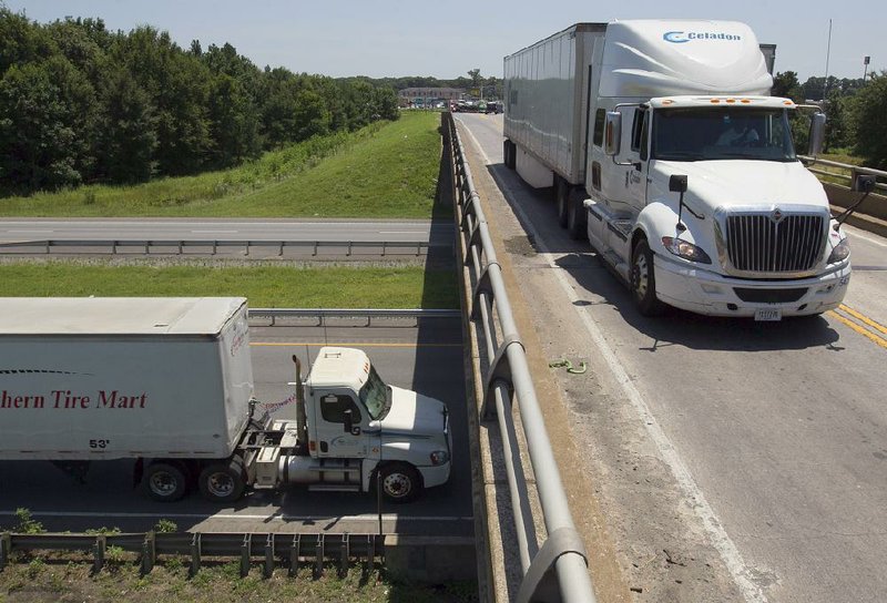 Arkansas Democrat-Gazette/BENJAMIN KRAIN --07/25/2014--
Trucks intersect while traveling on Interstate 40 and Galloway. 