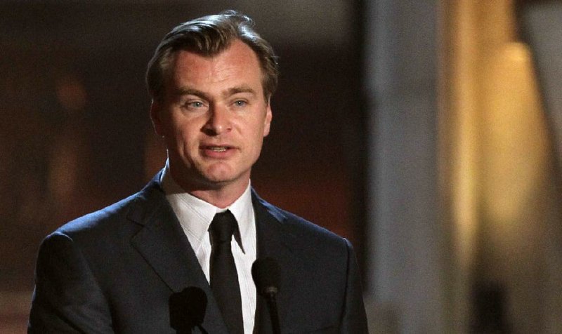 FILE - In this June 2, 2012 file photo, Christopher Nolan accepts the most manticipated movie award for "The Dark Knight Rises" at the 2012 Guys Choice Awards in Culver City, Calif. Its tough to get the writer-director Nolan to divulge details about the plot of his upcoming sci-fi movie Interstellar." Were right in the thick of the first cut of the film, he said on stage during a question and answer session at the annual movie-theater convention CinemaCon in Las Vegas on Wednesday, March 26, 2014. So I cant really say much about it right now. (Photo by Matt Sayles/Invision/AP, file)