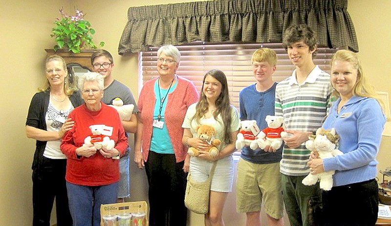Submitted photo Jessieville High School gifted and talented students delivered a new set of gifts to the Good Samaritan Society in Hot Springs Village in May. The variety of gifts was purchased to be used as prizes for residents, including Louella Leslie, front, in fun and activities. The purchases, made by Mary Neilson, a GT parent and advocate, were bought with money raised by the 9-12 grade GT students at Jessieville. Others gathered were Activities Director Linda Conner, Kevin Herrington, Good Samaritan Administrator Corinne White, Abbie Beaver, Jonathan Semmler, Andrew Martin and GT Coordinator Stephanie Malcom.