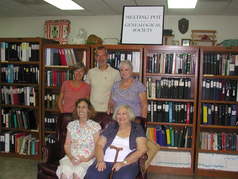 Submitted photo SEARCHING FOR FAMILY: Visitors from Belgium recently met with members of The Melting Pot Genealogical Society who had helped them in their quest to trace ancestors. From left standing are visitors Katrien Croonenberghs and Paul Philips, Charlene Nobles, MPGS president; seated, Miese Holmes (Philips&#8217; cousin), and Nancy Gibson, local author and MPGS volunteer researcher.