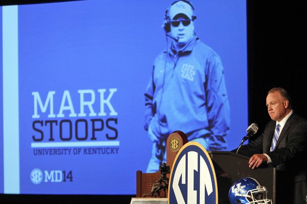 Kentucky coach Mark Stoops speaks to the media at the Southeastern Conference NCAA college football media days Thursday, July 17, 2014, in Hoover, Ala. (AP Photo/Butch Dill)