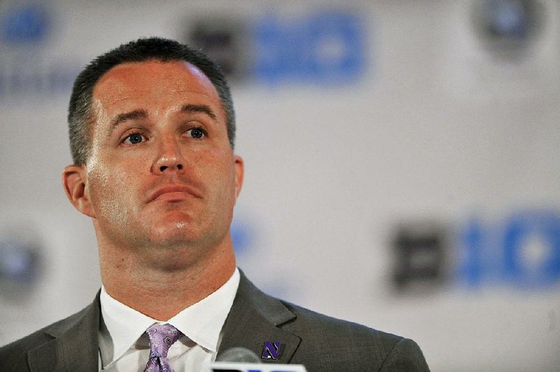 Northwestern head coach Pat Fitzgerald talks to the media during the Big Ten football media days in Chicago, Monday, July 28, 2014. (AP Photo/Paul Beaty)