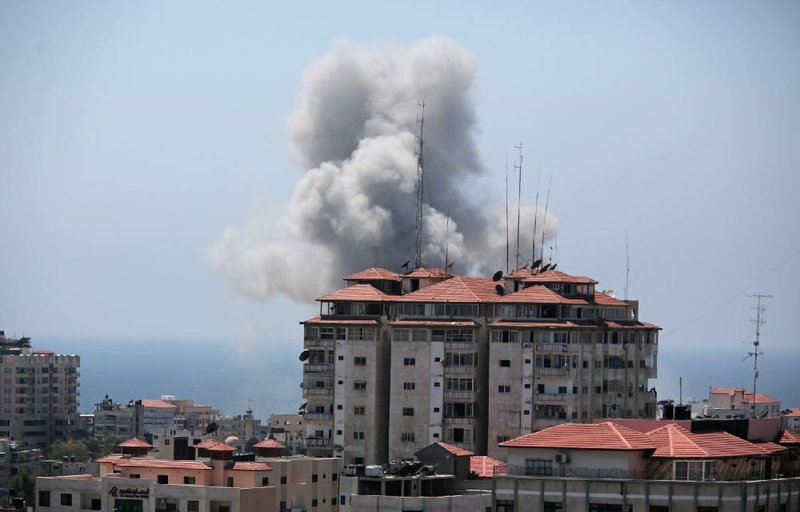 Smoke rises after an Israeli strike Sunday in Gaza City.