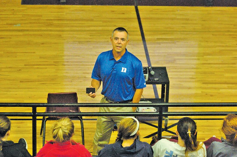 STAFF PHOTO RICK FIRES Greg Dale, Duke professor, talks to student-athletes from Lincoln, Gravette, and Siloam Springs on Wednesday about the mental aspect of playing sports.