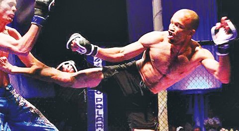 Submitted photo REMATCH: Hot Springs’ Dawond Pickney, performing a sidekick, faces Jimmy Van Horn on an MMA card Saturday night at Summit Arena. Pickney won a third-round TKO against Van Horn earlier this year.
