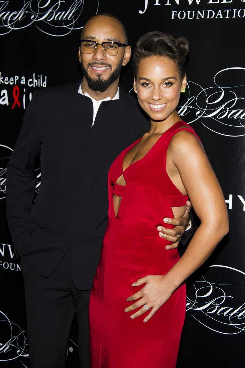 FILE - In this Thursday, Nov. 7, 2013, file photo, Swizz Beatz and Alicia Keys attend Keep a Child Alives 10th Annual Black Ball in New York. Keys is pregnant with her second child, making the announcement on Thursday, July 31, 2014, which also marks her fourth wedding anniversary to Beatz. (Photo by Charles Sykes/Invision/AP, File)