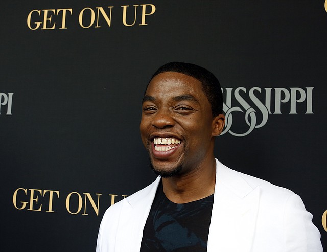 Chadwick Boseman, who stars as James Brown in "Get On Up," a movie based on the life story of "the Godfather of Soul" is interviewed in Madison, Miss., prior to a screening of the film, Sunday, July 27, 2014. The film, directed by Mississippi native Tate Taylor, depicts Brown's life from 5-years-old until he was 60. Brown died in 2006 at 73. 