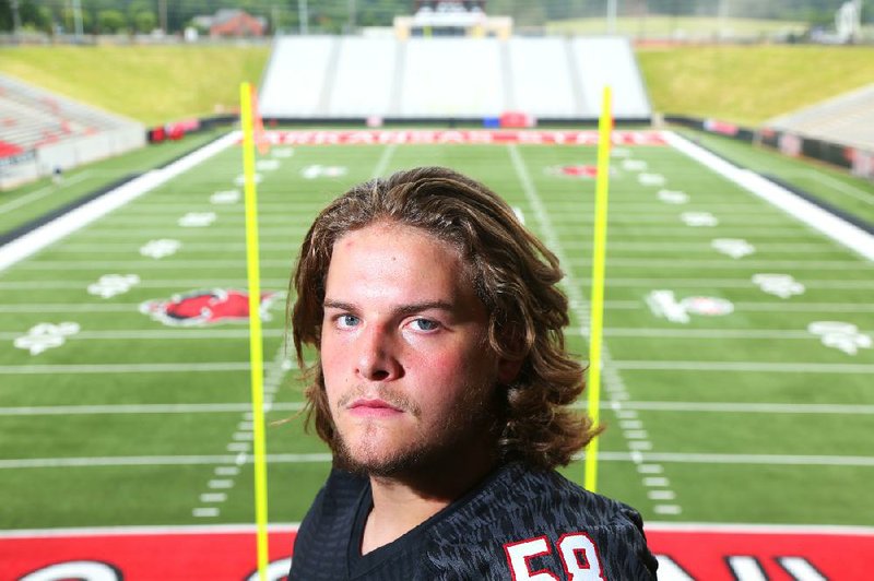 7/30/14
Arkansas Democrat-Gazette/STEPHEN B. THORNTON
Arkansas State Red Wolves Tyler Greve 58 during Wednesday's media day in Jonesboro.