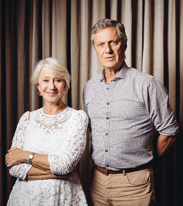 In this Saturday, July 12, 2014 photo, actress Helen Mirren, left, and director Lasse Hallstrom pose for a portrait during press day for "The Hundred-Foot Journey" at The Four Seasons in Los Angeles. In the film, directed by Hallstrom, Mirren plays Madame Mallory, a prickly and particular restaurateur who takes overcooked asparagus as a personal affront. Her Michelin-starred restaurant, set in a quaint village that looks like a postcard, is among the most celebrated in France, and Mallory presides unforgivingly over its staff and cuisine. (Photo by Casey Curry/Invision/AP)