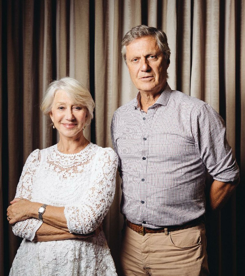 In this Saturday, July 12, 2014 photo, actress Helen Mirren, left, and director Lasse Hallstrom pose for a portrait during press day for "The Hundred-Foot Journey" at The Four Seasons in Los Angeles. In the film, directed by Hallstrom, Mirren plays Madame Mallory, a prickly and particular restaurateur who takes overcooked asparagus as a personal affront. Her Michelin-starred restaurant, set in a quaint village that looks like a postcard, is among the most celebrated in France, and Mallory presides unforgivingly over its staff and cuisine. (Photo by Casey Curry/Invision/AP)