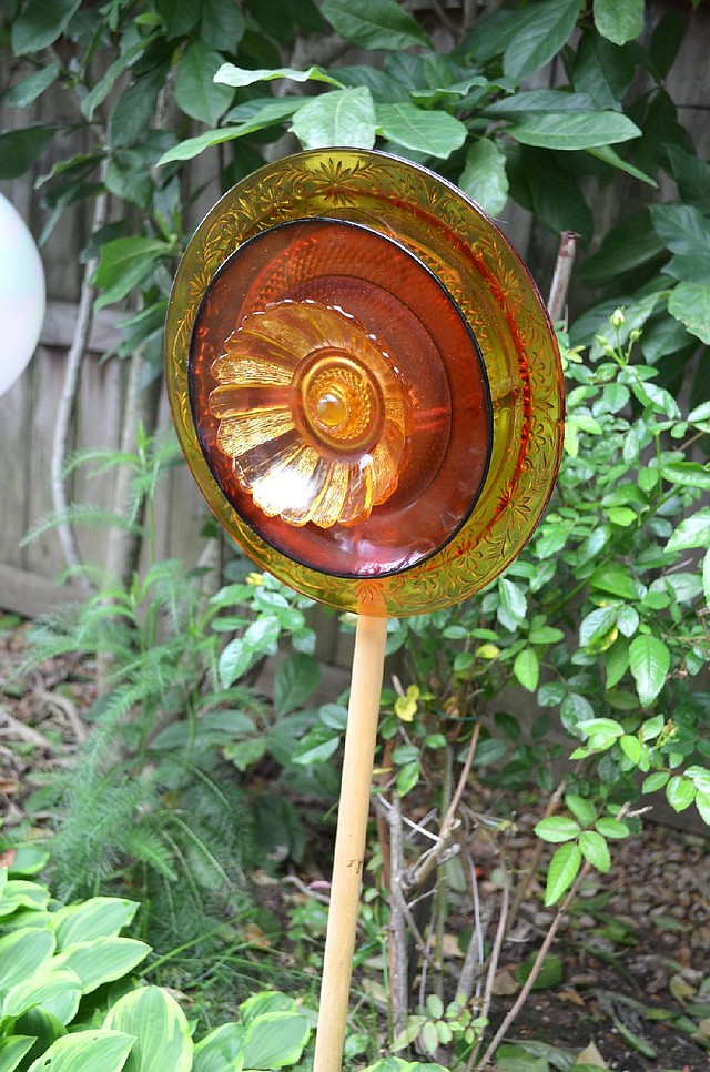 Special to the Democrat-Gazette/NATHANIA SAWYER

Syble McCleskey makes garden art from glassware.