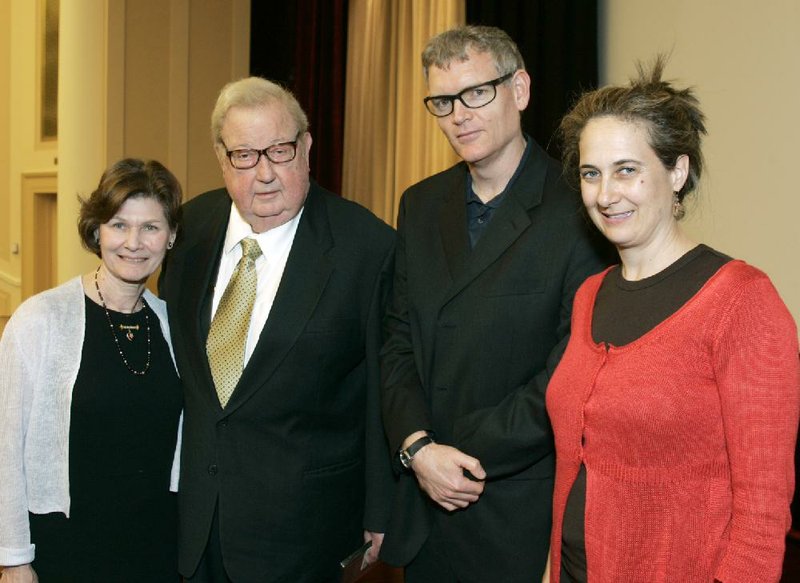 FILE - In this April 27, 2007 photo provided by the Academy of Motion Picture Arts and Sciences, Anne and Robert Drew, left, join Ed Carter and Grace Guggenheim, right, during an event honoring him at the National Archives in Washington, D.C. The "cinema verite" technique and its pioneer, documentary filmmaker Robert Drew, were celebrated by the National Archives and Records Administration and Hollywood's Academy of Motion Picture Arts and Sciences. Drews eldest son, Thatcher Drew, confirmed that the filmmaker died Wednesday morning, July 30, 2014, at his home in Sharon, Conn. (AP Photo/Neshan Naltchayan, AMPAS)