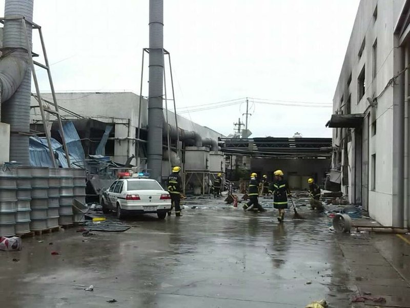 This photo released by China's Xinhua News Agency shows the site of an explosion at an eastern Chinese automotive parts factory in Kunshan City, Jiangsu Province Saturday, Aug. 2, 2014.  Dozens of people were killed Saturday by the explosion at the factory that supplies General Motors, state media reported. (AP Photo/Xinhua, Wang Hengzhi) NO SALES