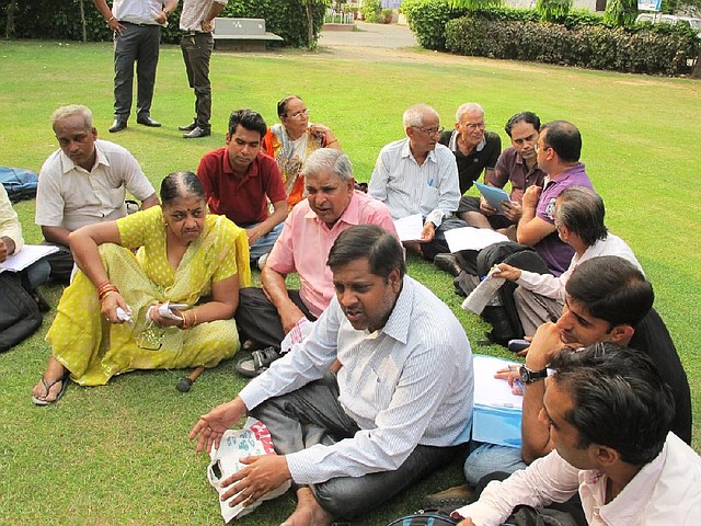 Family members facing dowry harassment charges — wrongfully, they say — gather on the courthouse lawn in New Delhi in a weekly meeting of a support group that says lying wives and manipulative daughters-in-law are the problem.