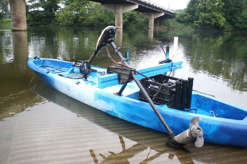 The completed project includes a 36-pound thrust trolling motor, transducer mount on the right side of the transom, an electronic graph and a milk crate converted to a three-rod holder and battery box. Even with a pilot, the added weight does not push the stern down far enough to take water up the stern scuppers.