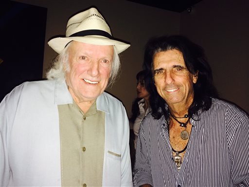 This June 17, 2014 photo released by Danny Zelisko shows Dick Wagner, left, and Alice Cooper. Wagner, the skilled guitarist who worked with Alice Cooper, Lou Reed, Kiss and Aerosmith, and also co-wrote many of Coopers hits, died of respiratory failure Wednesday, July 30, his personal manager and business partner said Friday. He was 71.