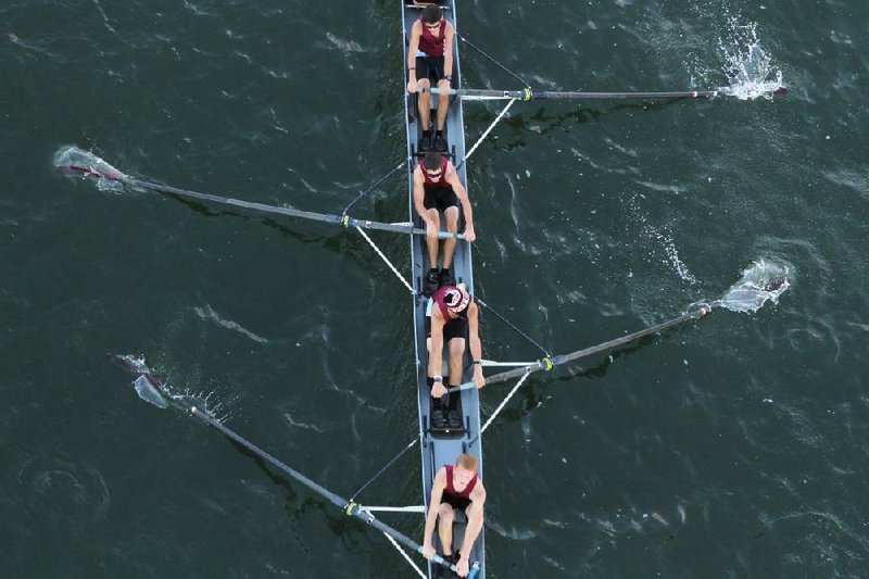 Staff Photo by Maura Friedman/Chattanooga Times Free Press 
November 02, 2013

A team races under the Market Street Bridge at the Head of the Hooch Rowing Regatta, a major rowing competition co-hosted by the Atlanta Rowing Club and the Lookout Rowing Club, off of Ross's Landing on Saturday in Chattanooga, Tenn. 