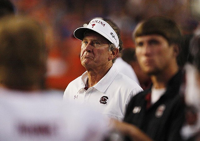 South Carolina head coach Steve Spurrier looks up at the scoreboard as time winds down on a 44-11 loss to Florida at Ben Hill Griffin Stadium in Gainesville, Florida, on Saturday, Ocotber 20, 2012. (Gerry Melendez/The State/MCT)