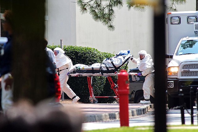 Nancy Writebol, an American aid worker from North Carolina who was infected with the Ebola virus while working in Liberia, arrives at Emory University Hospital in Atlanta on Tuesday. 