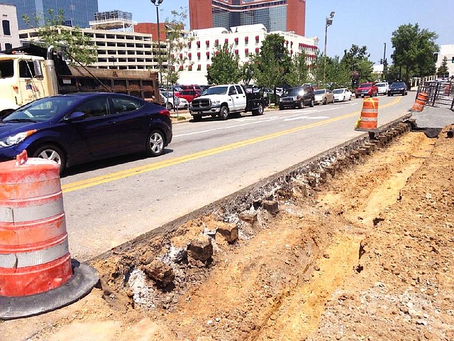 A line of concrete-encased railroad ties that once supported Little Rock’s old streetcar system were exposed during a construction project recently in the 200 block of Main Street
