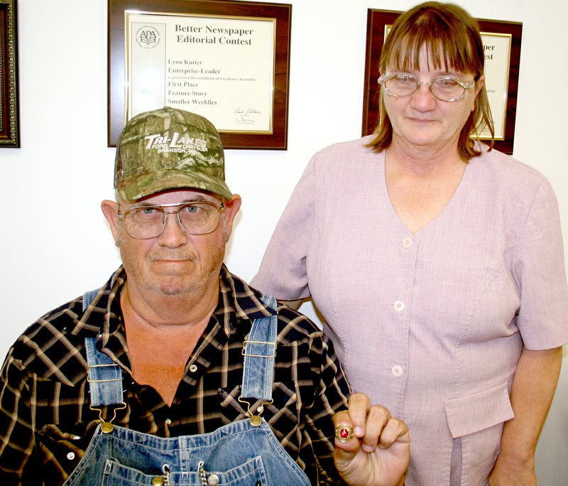 Photo by Pat Harris Gary Newberry holds the 1967 Farmington High School class ring that had belonged to his brother, W.L. Newberry. Mary Newberry said they were &#8220;shocked&#8221; when they were notified the ring had been found in Decatur. W.L. lost the ring in 1968.