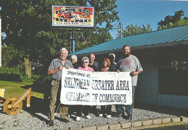 Photograph submitted SELIGMAN, Mo. &#8212; AK&#8217;s Biker&#8217;s N Bling are new members of Seligman Chamber of Commerce. Adam Norman and family, Kathy, Tiffany and Chelsea has opened a new store in Gateway, Ark., located at 20185 East U.S. Highway 62 and Arkansas Hwy. 37 junction. They opened the store June 1. The store has bikers apparel and accessories, helmets, shirts, leathers, also women&#8217;s purses, jewelry, flip flops, belts, hats, sunglasses and stun guns. The shop offers a tanning booth, a pool table outside with a covered seating area and garage rental. Also Colf Garden is located there, you can buy all kinds of vegetables and flowers. Hours are 10 a.m. - 6 p.m. Tuesday though Friday, 9 a.m. - 6 p.m. Saturday and noon - 5 p.m. Sunday. Hours may change seasonally. For information, call 479-656-7433.