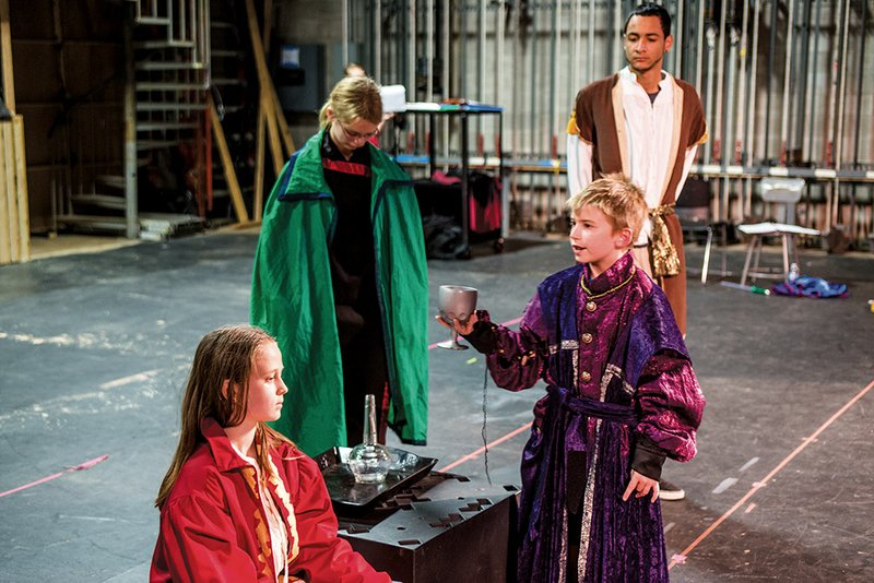 Anna McLearn, from left, Sarah Wyatt, Jared Humphrey and Marcus Hunter rehearse a scene from Macbeth. The ASU-Beebe Star Children’s Theater will present the play Friday evening in honor of Ruth L. Couch.