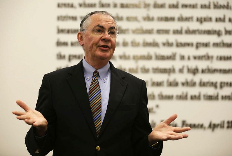 Wake Forest University president Nathan O. Hatch, chair of the NCAA board of directors,  gestures while speaking at NCAA headquarters in Indianapolis, Thursday, Aug. 7, 2014. The NCAA Board of Directors overwhelmingly approved a package of historic reforms Thursday that will give the nation's five biggest conferences the ability to unilaterally change some of the basic rules governing college sports. (AP Photo/Michael Conroy)