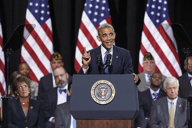 President Barack Obama speaks at Fort Belvoir, Va., Thursday, August 7, 2014, about H.R. 3230, the Veterans’ Access to Care through Choice, Accountability, and Transparency Act of 2014. The bill gives resources to the Department of Veterans Affairs to improve access and quality of care for veterans.. (AP Photo/J. Scott Applewhite)