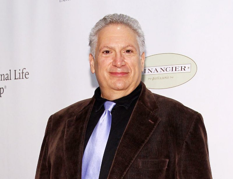 FILE - This May 16, 2014 file photo shows Harvey Fierstein at the 80th Annual Drama League Awards in New York. The 60-year-old is looking for a chance to return to the stage after some very successful years writing for the stage. (Photo by Mark Von Holden/Invision/AP, File)