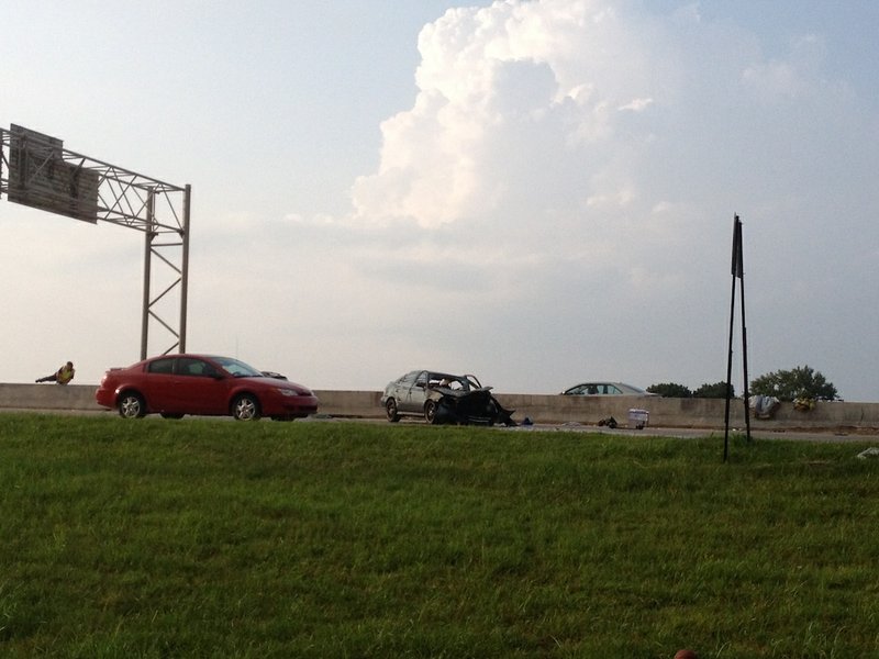 A wreck Friday, Aug. 8, 2014, on westbound Interstate 630 in Little Rock blocks a lane of traffic.