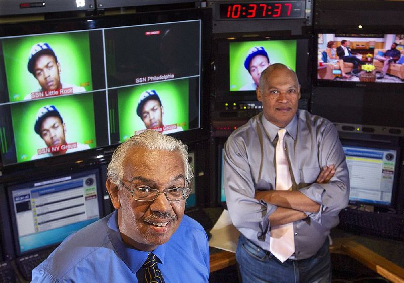 Arkansas Democrat-Gazette/BENJAMIN KRAIN --08/6/2014--
Soul of the South television network news director Tom Jacobs , left, and Chairman Doug Henry, right, will soon broadcast a live newscast from Little Rock where the national network's studio and control room is.