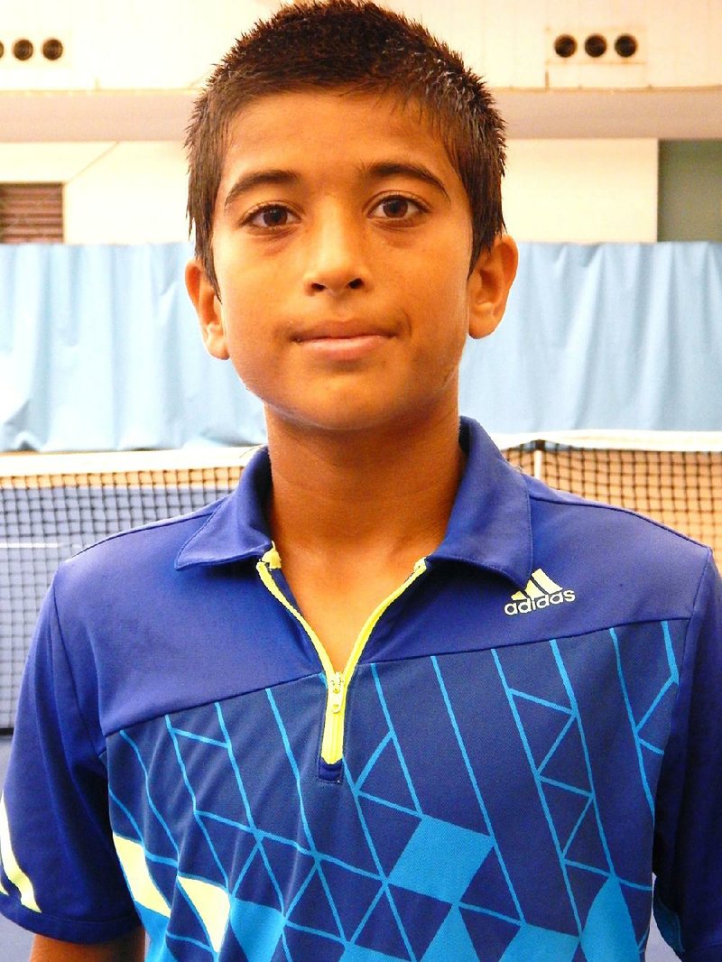 Arkansas Democrat-Gazette/Frankie Frisco
Zane Khan, winner of the USTA Boys 12 National Championship, held today (Friday, Aug. 8) at Burns Park Tennis Center in North Little Rock.