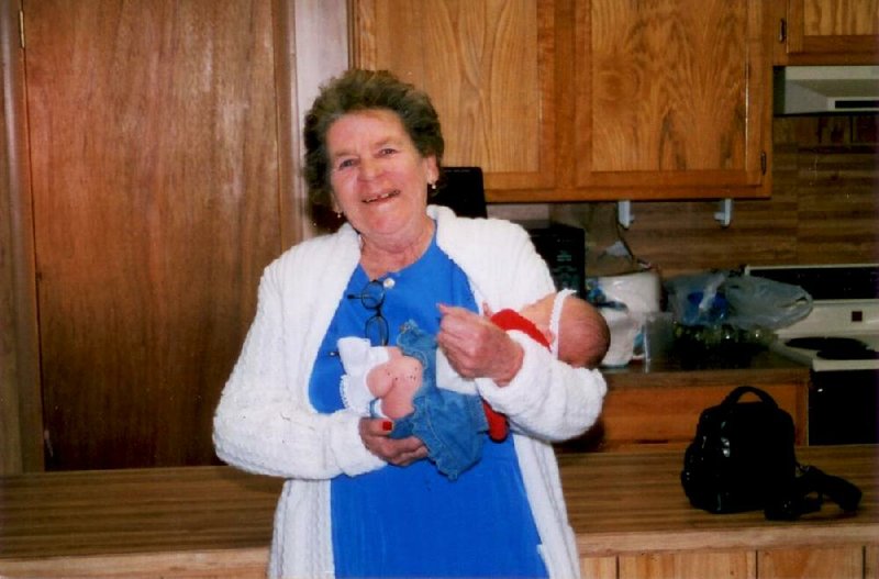 Martha Bull holds her great-granddaughter in this undated family photo.