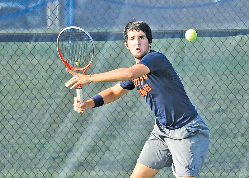  STAFF PHOTO FLIP PUTTHOFF Derek Groomer, Rogers Heritage senior, will be the No. 1 singles tennis player for the War Eagles this fall.