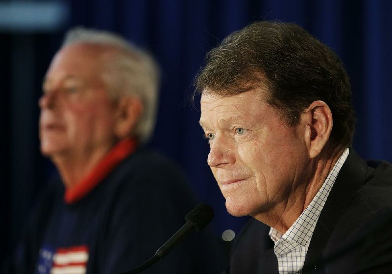 United States Ryder Cup Captain Tom Watson, right, speaks at a news conference at Valhalla Golf Club Monday, Aug. 11, 2014, in Louisville, Ky. At left is PGA of America president Ted Bishop. (AP Photo/John Locher)
