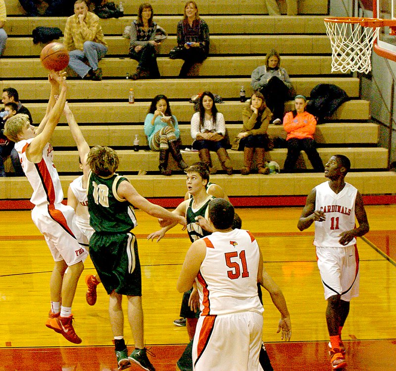 MARK HUMPHREY ENTERPRISE-LEADER Farmington&#8217;s Jeremy Muller launches a contested pull-up jump-shot against Alma. The Airedales pulled away in the fourth quarter to record a 57-44 win at Farmington in January. Farmington may face 6A schools in games that count in conference standings in 2016.