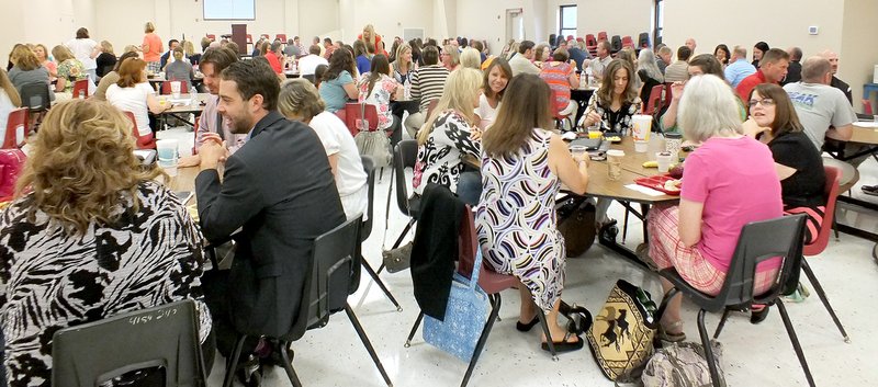 TIMES photograph by Annette Beard Pea Ridge teachers, two School Board members, Bright Futures Advisory Board members, civic leaders were treated to breakfast Monday morning and were addressed by Dr. C.J. Huff, Joplin, Mo., school superintdent. They were challenged to ask themselves &#8220;Why?&#8221; &#8212; &#8221;Why are you here?&#8221; and &#8220;Why do you get out of bed every morning?&#8221;