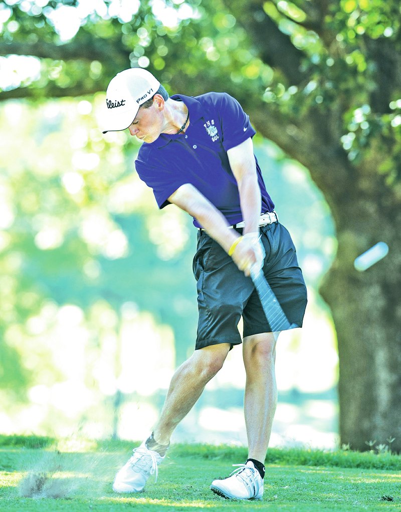 STAFF PHOTO ANTHONY REYES &#8226; @NWATONYR Matt Cole, Fayetteville senior, tees off on hole seven Tuesday at Paradise Valley Country Club in Fayetteville.