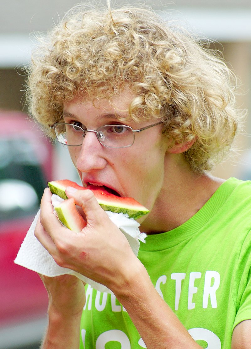 Photo by Randy Moll
Danny DeLapp, 15, finishes a piece of watermelon at the Gravette Days celebration on Saturday in Kindley Park.