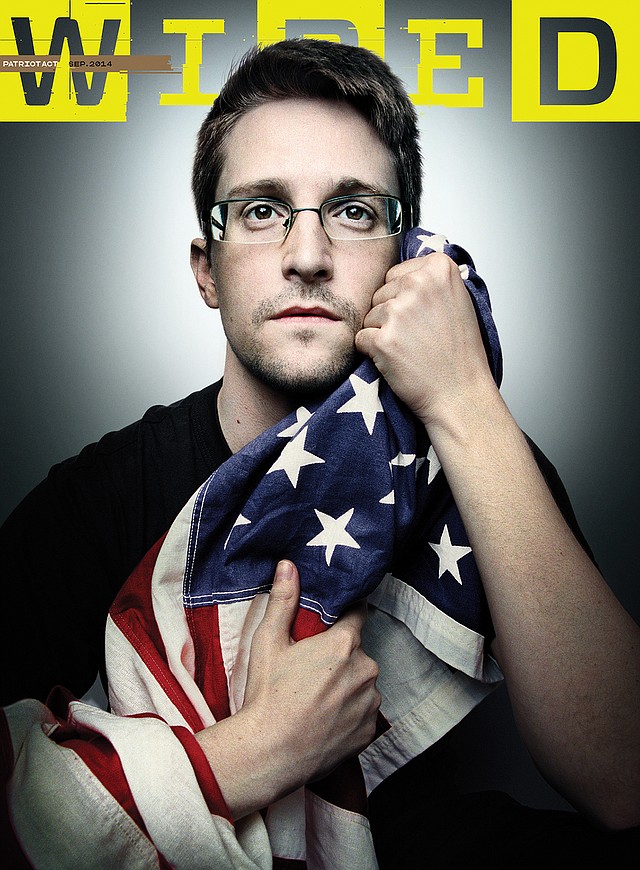 This image provided by Platon/Wired shows the cover of the September 2014 issue of Wired magazine, featuring former National Security Agency contractor Edward Snowden. Snowden gave an exclusive interview with Wired, in the issue scheduled to hit newsstands on Aug. 26, 2014.