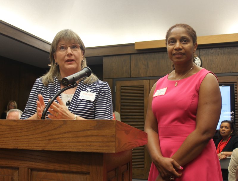 Kathy Smith, senior program officer of the Walton Family Foundation, left, and Sherece Y. West-Scantlebury, president and CEO of the Winthrop Rockefeller Foundation, address the state Board of Education Thursday.