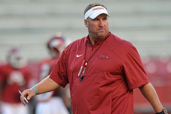 Arkansas coach Bret Bielema watches during practice Wednesday, Aug. 13, 2014 at Razorback Stadium in Fayetteville. 