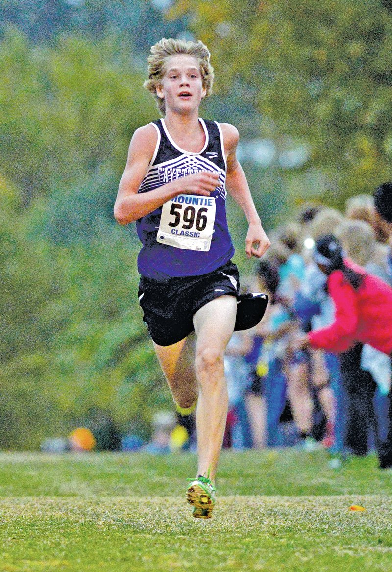 FILE PHOTO ANTHONY REYES Collin Pilkington of Fayetteville approaches the finish line Oct. 29 during the 7A boys race at the Rogers Classic cross country race at Rogers High School. Pilkington is the top returner on the Bulldogs&#8217; team that finished fourth at the 7A state meet last season.